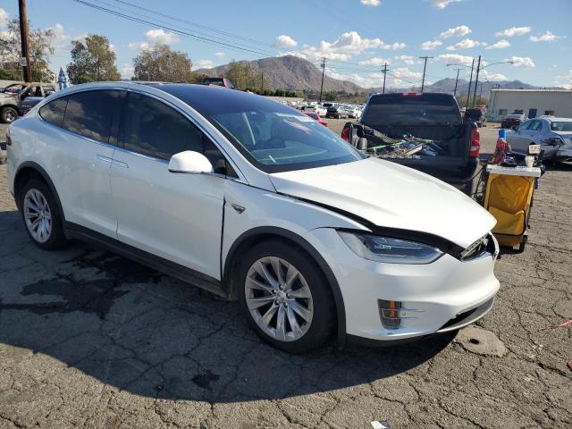 TESLA MODEL X 2016 with VIN 5YJXCBE22GF002064 - Photo from auction