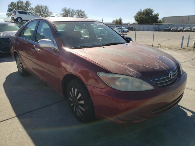 TOYOTA CAMRY LE 2002 with VIN JTDBE32K420093845 - Photo from auction