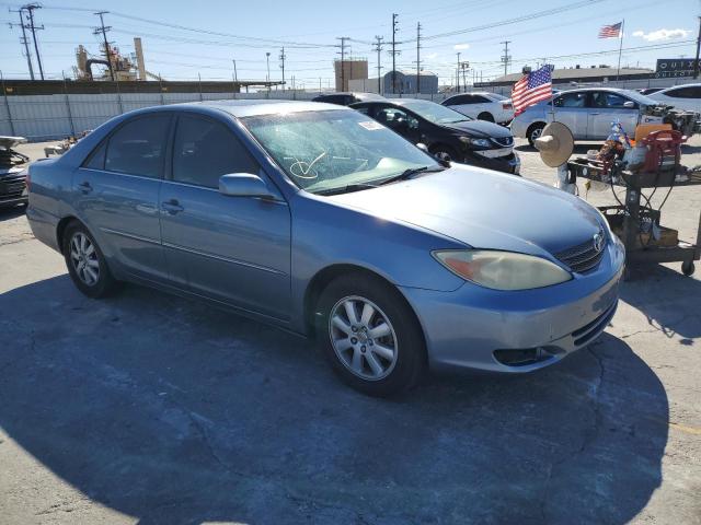 Photo 4 from auction – 2002 TOYOTA CAMRY LE with VIN JTDBF30K120085377