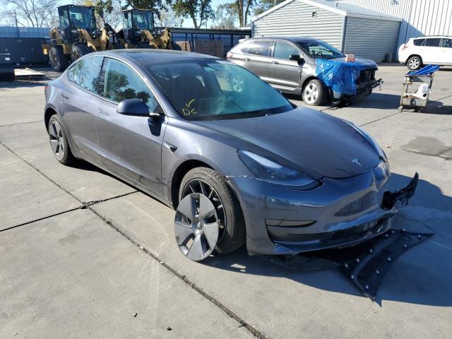 TESLA MODEL 3 2021 with VIN 5YJ3E1EA8MF057687 - Photo from auction