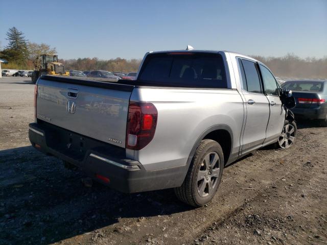 Photo 4 from auction – 2020 HONDA RIDGELINE with VIN 5FPYK3F77LB014431