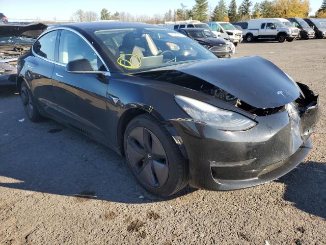 TESLA MODEL 3 2018 with VIN 5YJ3E1EB2JF118701 - Photo from auction