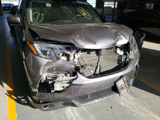 Photo 9 from auction – 2018 HONDA PILOT TOUR with VIN 5FNYF6H95JB020058