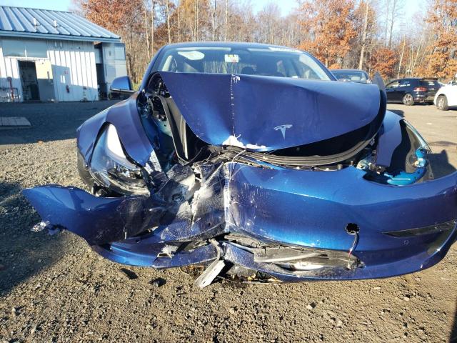 Photo 9 from auction – 2022 TESLA MODEL 3 with VIN 5YJ3E1EA3NF371930