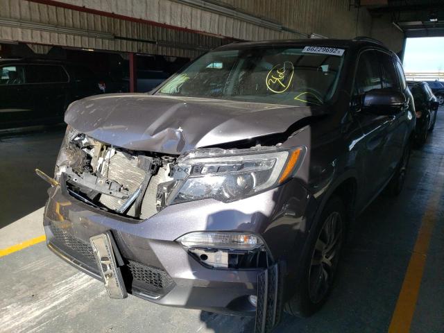 Photo 2 from auction – 2018 HONDA PILOT TOUR with VIN 5FNYF6H95JB020058
