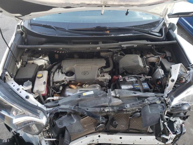 Photo 7 from auction – 2018 TOYOTA RAV4 XLE with VIN 2T3WFREV0JW411087