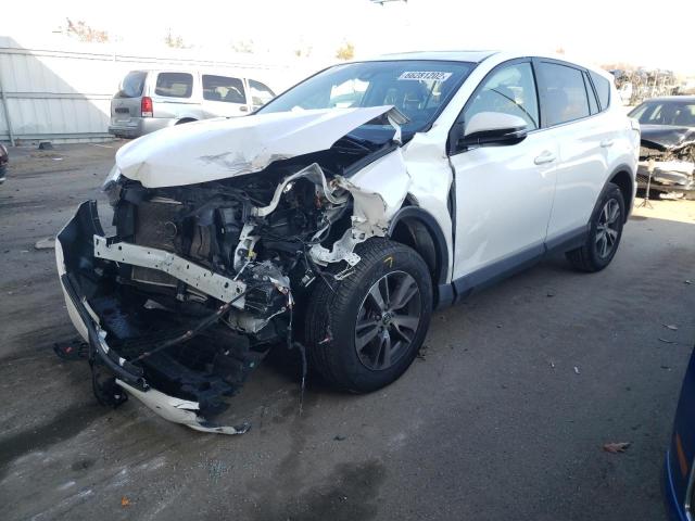 Photo 2 from auction – 2018 TOYOTA RAV4 XLE with VIN 2T3WFREV0JW411087