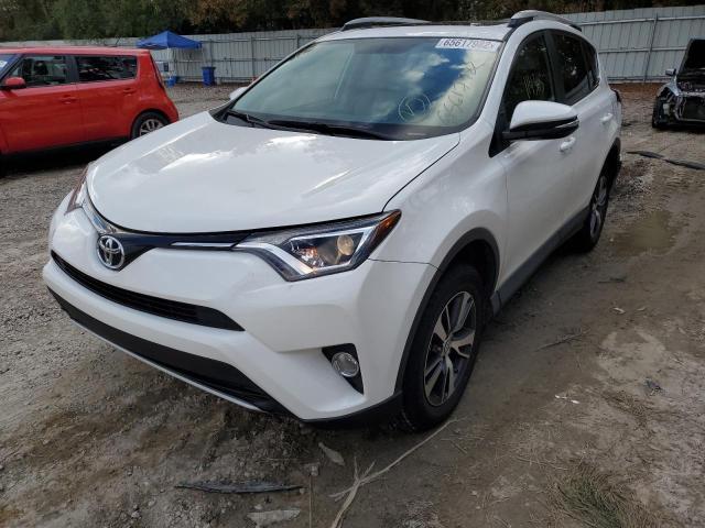 Photo 2 from auction – 2016 TOYOTA RAV4 XLE with VIN 2T3RFREV1GW513827