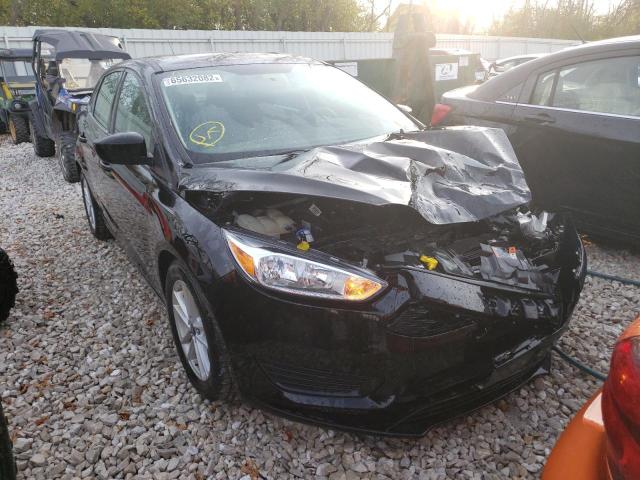 FORD FOCUS SE 2018 with VIN 1FADP3F29JL223781 - Photo from auction