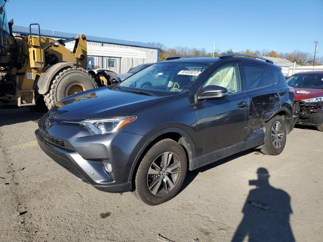 Photo 2 from auction – 2017 TOYOTA RAV4 XLE with VIN JTMRFREV1HJ705703