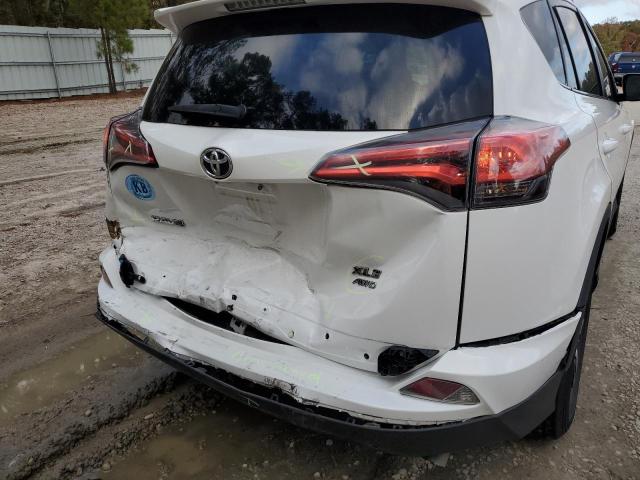 Photo 9 from auction – 2016 TOYOTA RAV4 XLE with VIN 2T3RFREV1GW513827