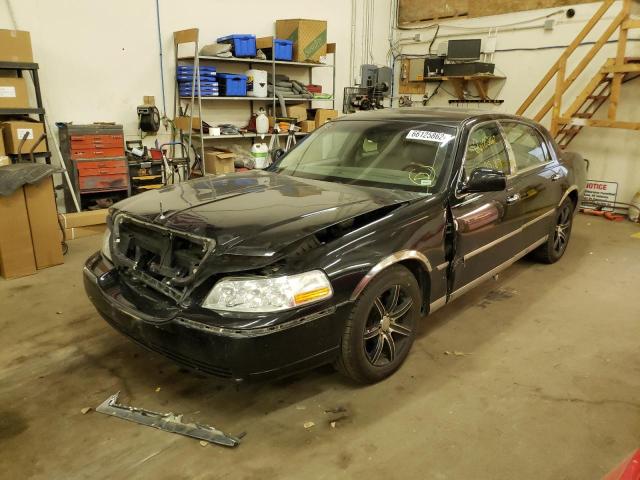 Photo 2 from auction – 2004 LINCOLN TOWNCAR with VIN 1LNHM83W34Y653432
