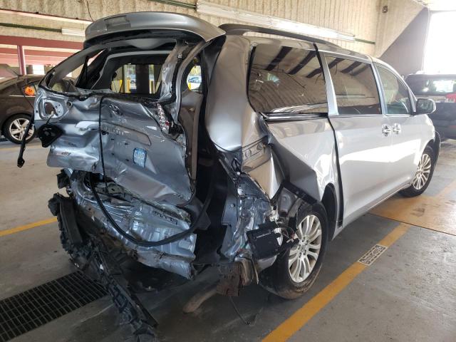 Photo 4 from auction – 2014 TOYOTA SIENNA XLE with VIN 5TDYK3DC2ES474328
