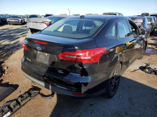 Photo 4 from auction – 2016 FORD FOCUS SE with VIN 1FADP3FE1GL328432