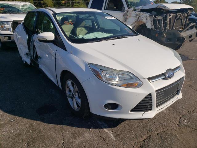 FORD FOCUS 2014 with VIN 1FADP3F23EL425943 - Photo from auction