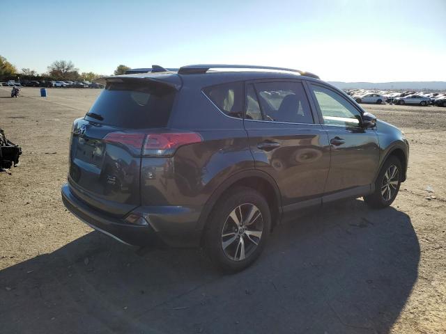 Photo 4 from auction – 2017 TOYOTA RAV4 XLE with VIN JTMRFREV1HJ705703