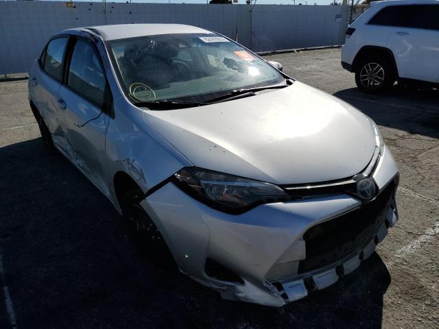TOYOTA COROLLA L 2018 with VIN 5YFBURHE3JP855140 - Photo from auction