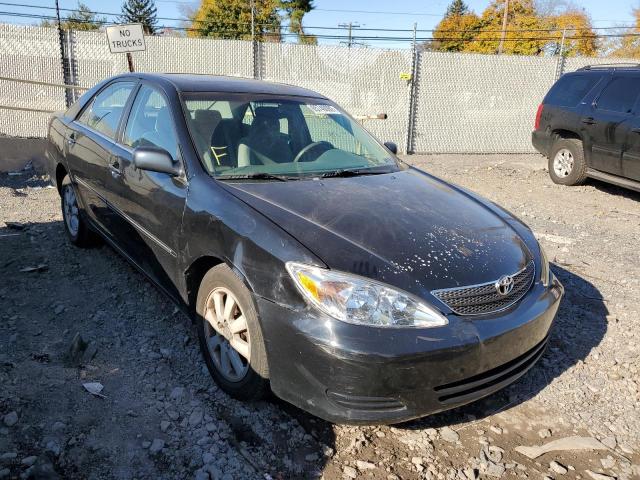 TOYOTA CAMRY LE 2002 with VIN 4T1BE30K52U035685 - Photo from auction