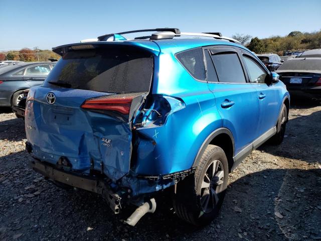 Photo 4 from auction – 2016 TOYOTA RAV4 XLE with VIN 2T3RFREV8GW505532