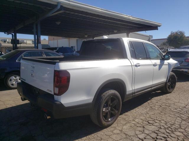Photo 4 from auction – 2022 HONDA RIDGELINE with VIN 5FPYK3F8XNB007162