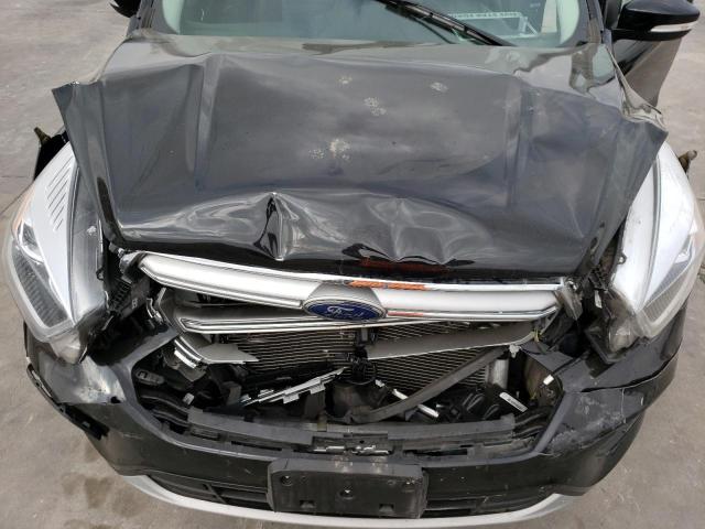 Photo 12 from auction – 2017 FORD ESCAPE TIT with VIN 1FMCU9J94HUD10204