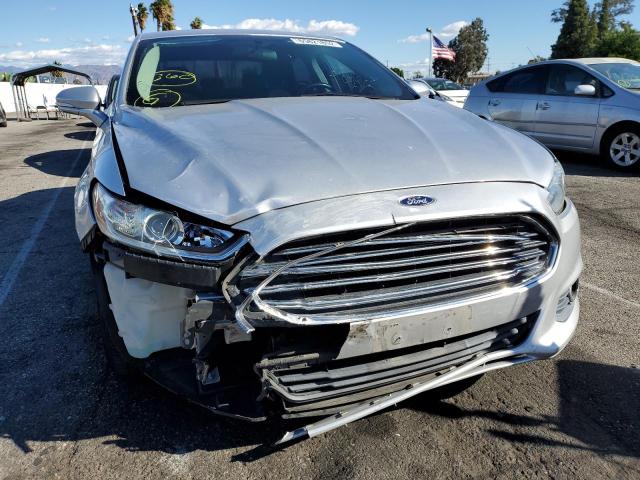 Photo 9 from auction – 2013 FORD FUSION SE with VIN 3FA6P0LU1DR325806
