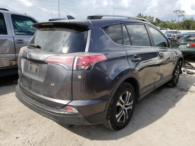 Photo 3 from auction – 2017 TOYOTA RAV4 LE with VIN JTMZFREV1HJ136299