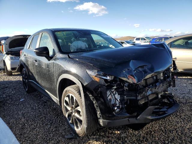 MAZDA CX-5 GT 2016 with VIN JM3KE4DY8G0623126 - Photo from auction