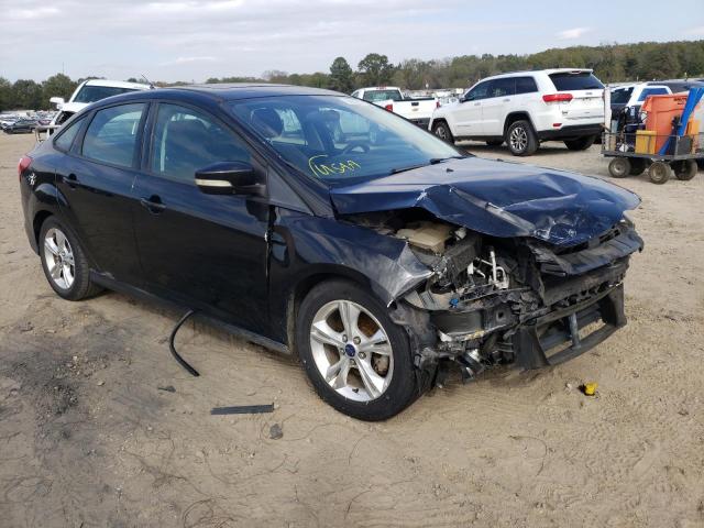 FORD FOCUS SE 2014 with VIN 1FADP3F28EL317513 - Photo from auction