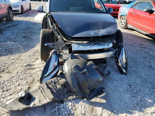 Photo 9 from auction – 2022 TESLA MODEL Y with VIN 7SAYGDEE1NA003377