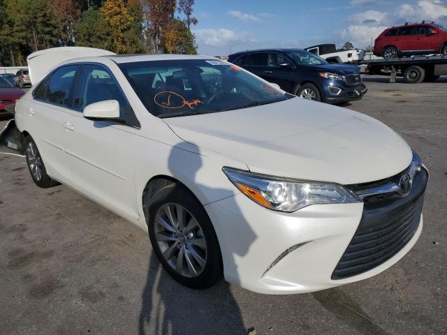 TOYOTA CAMRY LE 2017 with VIN 4T1BF1FK0HU643096 - Photo from auction