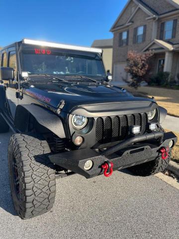 JEEP WRANGLER U 2015 with VIN 1C4BJWFG3FL575889 - Photo from auction
