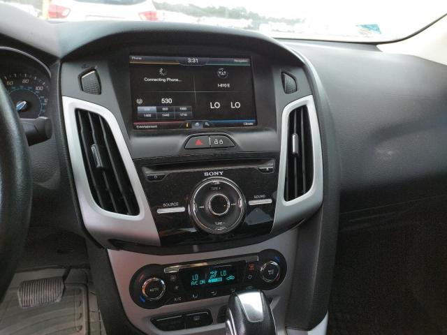 Photo 9 from auction – 2014 FORD FOCUS SE with VIN 1FADP3F23EL305401