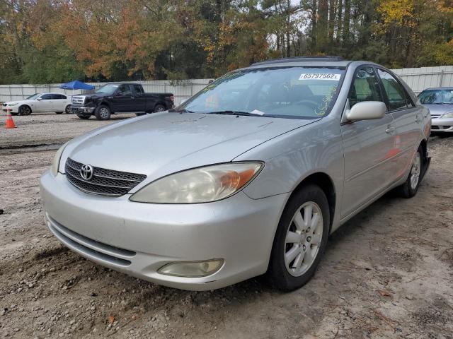 Photo 2 from auction – 2004 TOYOTA CAMRY LE with VIN 4T1BF32KX4U571058
