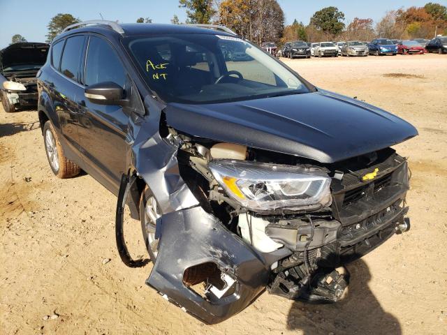 FORD ESCAPE TIT 2017 with VIN 1FMCU0J95HUF09676 - Photo from auction
