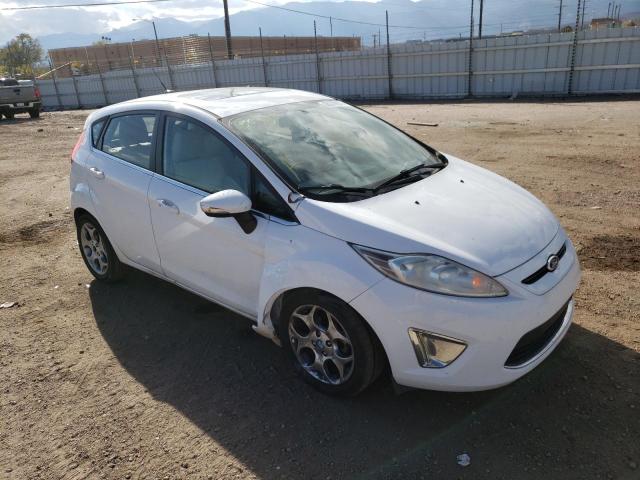 FORD FIESTA SES 2011 with VIN 3FADP4FJ5BM180540 - Photo from auction