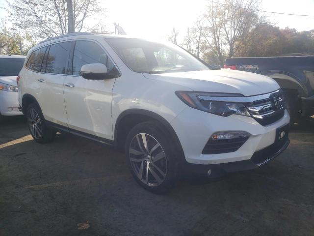 HONDA PILOT ELIT 2018 with VIN 5FNYF6H04JB019534 - Photo from auction