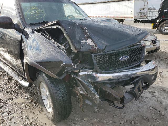Photo 9 from auction – 2002 FORD F150 with VIN 1FTRX18L52NA57033