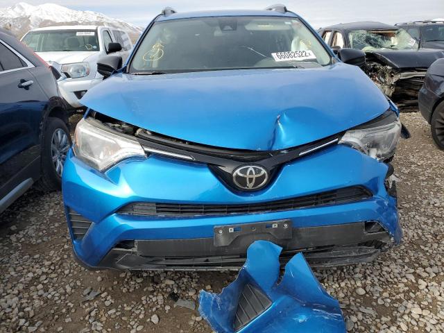 Photo 9 from auction – 2018 TOYOTA RAV4 LE with VIN JTMZFREV7JJ158104