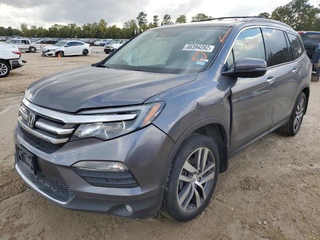 Photo 2 from auction – 2017 HONDA PILOT TOUR with VIN 5FNYF5H97HB001306