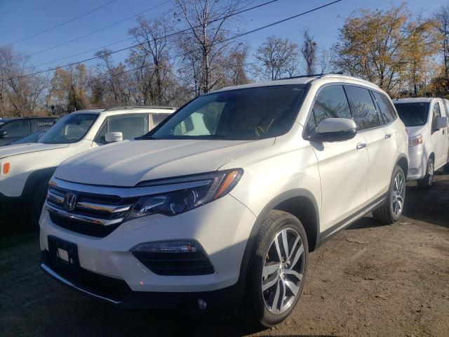 Photo 2 from auction – 2018 HONDA PILOT ELIT with VIN 5FNYF6H04JB019534