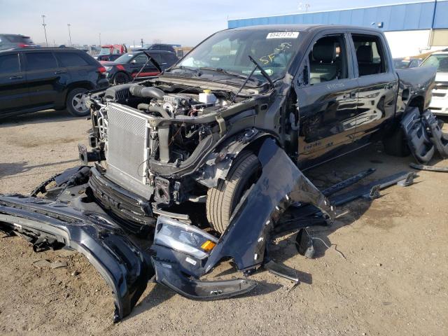 Photo 2 from auction – 2021 RAM 1500 LARAM with VIN 1C6SRFJT8MN621822