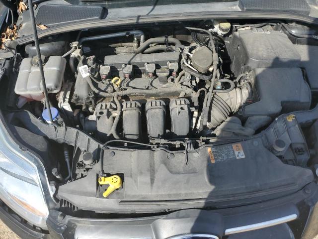 Foto 7 de la subasta – 2014 FORD FOCUS SE con VIN 1FADP3F27EL281412