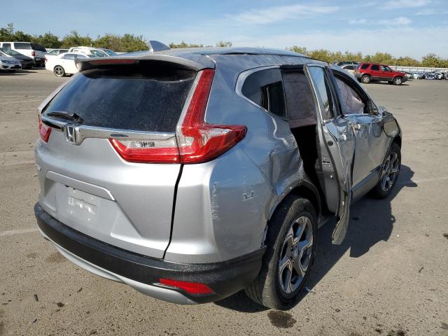 Photo 4 from auction – 2018 HONDA CR-V EX with VIN 5J6RW1H54JA009138