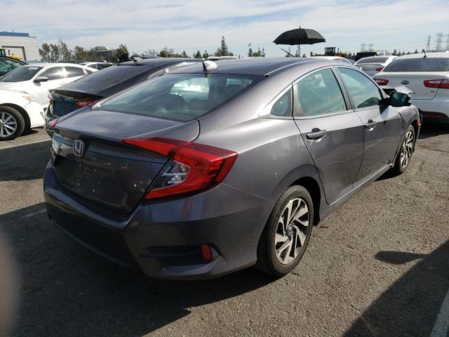 Photo 4 from auction – 2018 HONDA CIVIC EX with VIN 2HGFC2F74JH546669