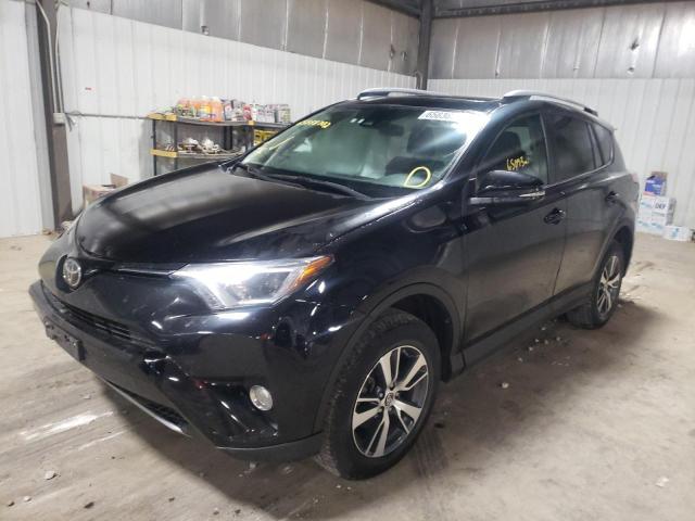 Photo 2 from auction – 2017 TOYOTA RAV4 XLE with VIN 2T3RFREV9HW671575
