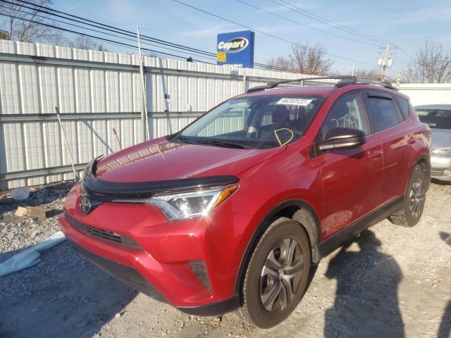 Photo 2 from auction – 2017 TOYOTA RAV4 LE with VIN JTMZFREV0HJ106033