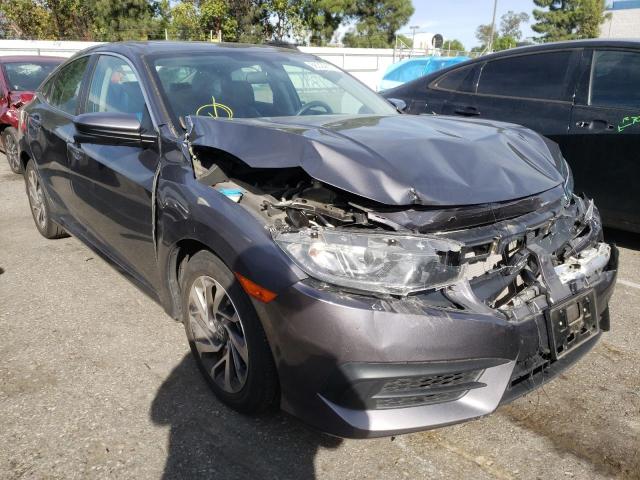 HONDA CIVIC EX 2018 with VIN 2HGFC2F74JH546669 - Photo from auction