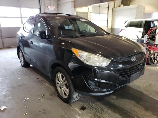 HYUNDAI TUCSON GLS 2012 with VIN KM8JUCAC4CU372338 - Photo from auction