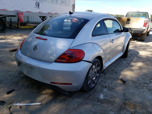 Photo 4 from auction – 2012 VOLKSWAGEN BEETLE with VIN 3VWJP7AT7CM604354